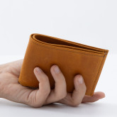 Тонкий кожаный кошелек рыжий с винтажным эффектом