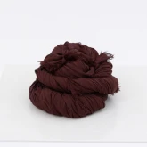 Большой платок на шею коричневый, сложенный компактно