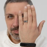 Черный плетеный кожаный браслет